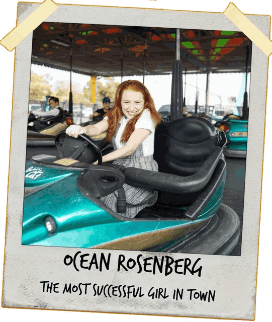 A taped polaroid picture of Ocean Rosenberg on a bumper car. The handwritten text on the polaroid reads ‘OCEAN ROSENBERG, THE MOST SUCCESSFUL GIRL IN TOWN’
